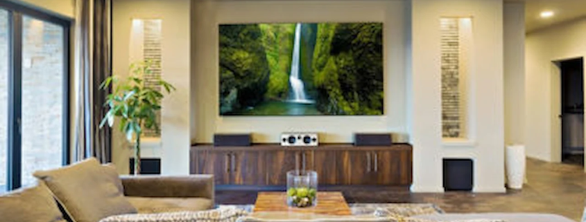 Custom lighting design Costa Rica in modern luxury living room with layered ceiling and ambient lighting